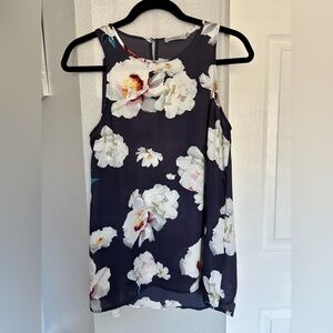 Dalia Floral Sleeveless Blouse - Black and White Size S
Flowy Summer Feminine